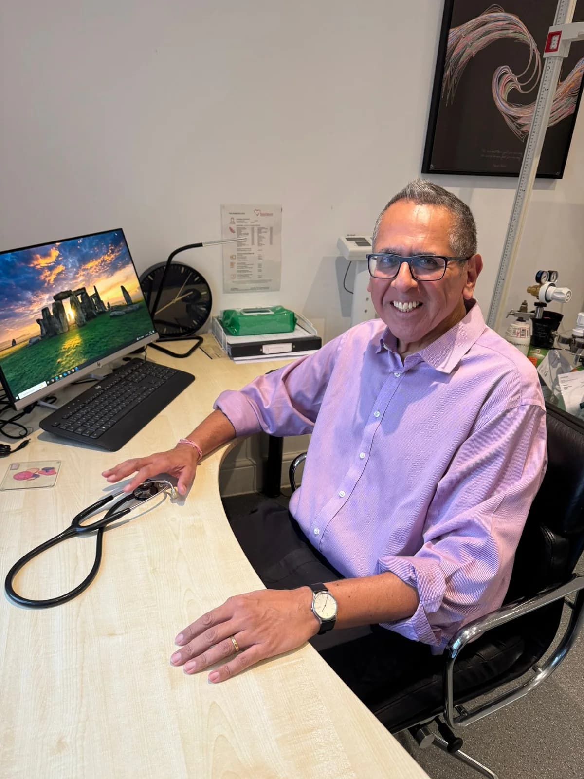 Dr Arvind Vasudeva at his desk